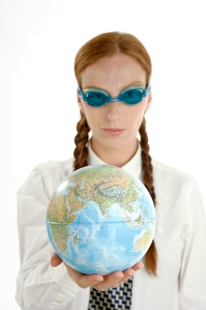 Business woman with goggles and world map