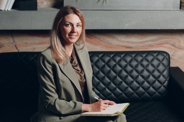 Business woman young adult coach at office.