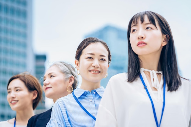 Business women lined up outdoors