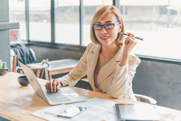 Business women posing for work in the office