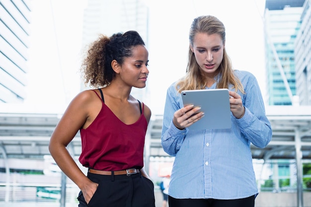 Business women talking Find a solution to problems arising from doing business together