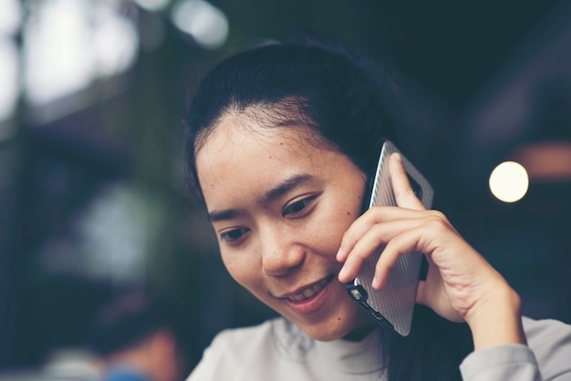 Business women using smartphone for work