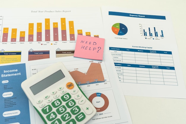 Business working paper with a diagram calculator pen on desk accounting concept