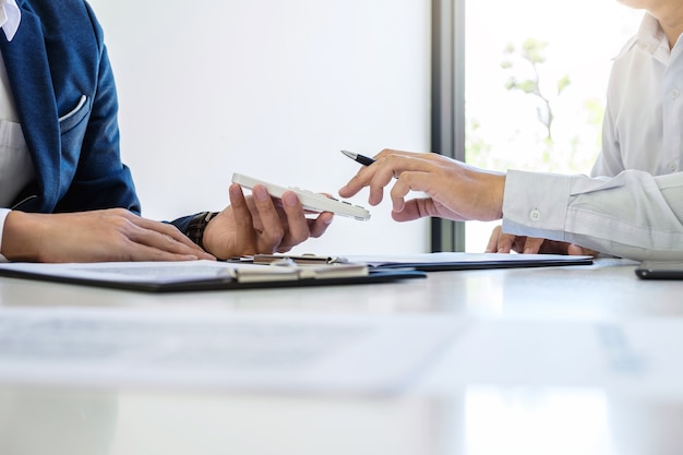 Businessman being analysis and making the decision a car insurance policy