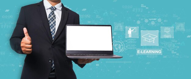 Businessman in black suit holding laptop and thumbs up virtual screen on blue background elearning education Internet Technology Webinar Online Courses concept