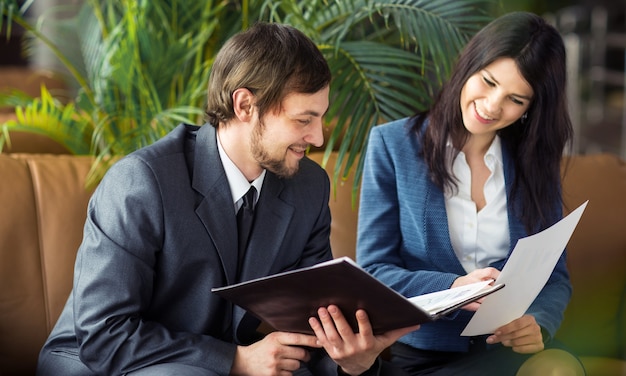 Businessman And Businesswoman Meeting In Modern Office