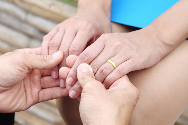 Businessman and businesswomen hold hand