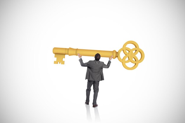 Photo businessman carrying large key with arms raised against white background with vignette