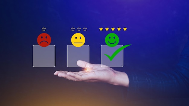 Businessman choosing happy smile face icon feedback rating and positive customer review experience satisfaction survey mental health assessment