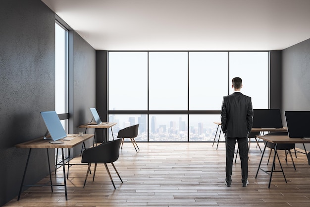 Businessman in contemporary office interior