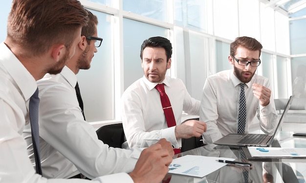 Businessman discussing new ideas with business team