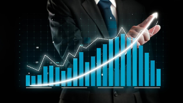 Businessman draw finance allusive graph chart showing business profit growth