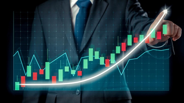 Businessman draw finance allusive graph chart showing business profit growth