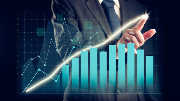 Businessman draw finance allusive graph chart showing business profit growth