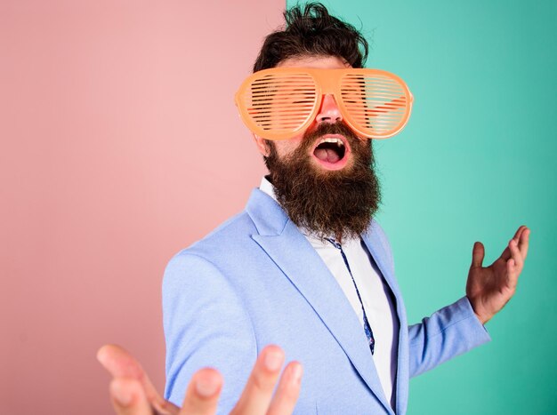 Photo businessman fed up being serious enjoy being yourself sincere and natural hipster formal clothes having fun just want to have fun man with beard and mustache wear funny eyeglasses fun and relax