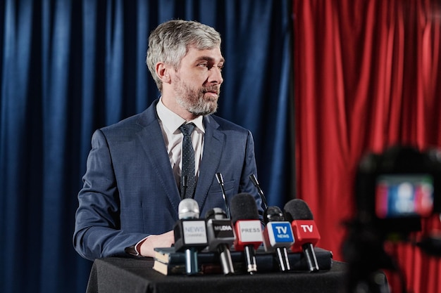 Businessman giving an interview at conference