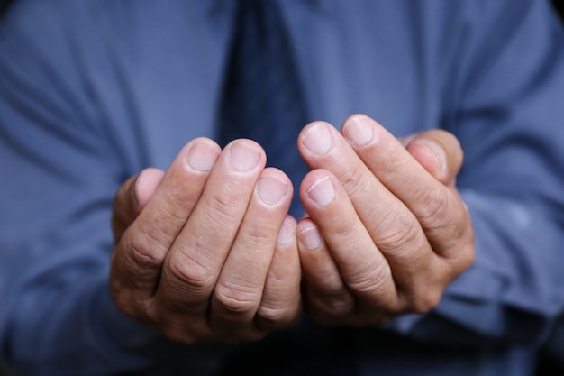 businessman hand hold for help