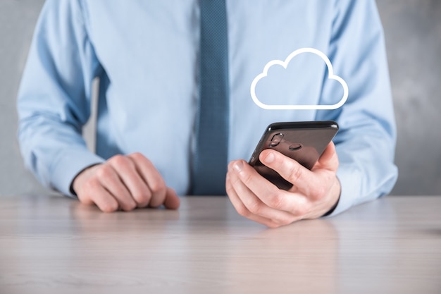 Businessman hand holding cloud