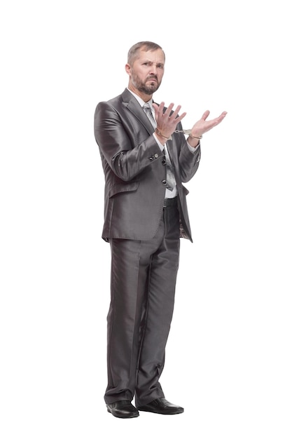 Businessman in handcuffs. isolated on a white background.