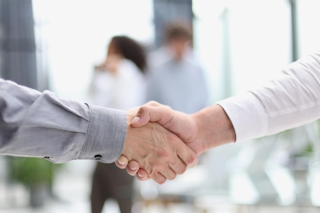 Businessman handshake for teamwork of business merger and acquisition