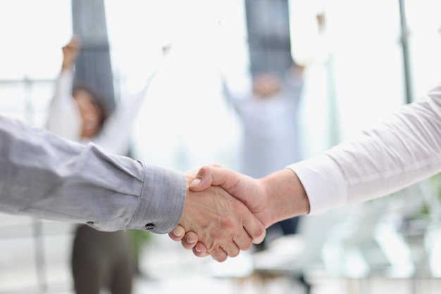 Businessman handshake for teamwork of business merger and acquisition