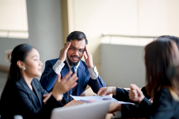 Businessman having a meeting with executives