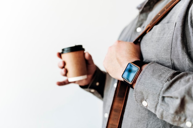 Businessman having take away coffee