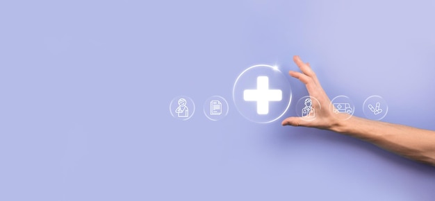 Photo businessman hold virtual plus medical network connection icons. covid-19 pandemic develop people awareness and spread attention on their healthcare.doctor,document,medicine,ambulance,patient icon.