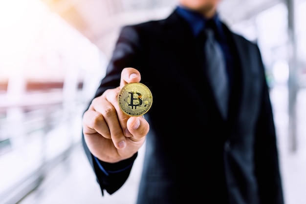 Businessman Holding Bitcoin