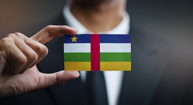 Businessman Holding Card of Central African Republic Flag 