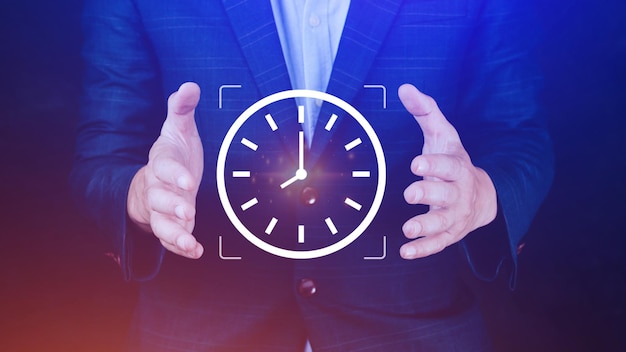 Businessman holding clock digital interface with icon Business time management Business time management and business plans concepts idea and concept of the schedule of the daily routine