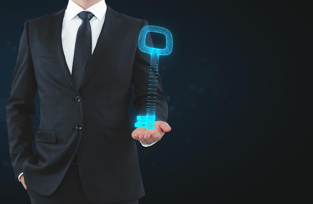 Businessman holding digital key