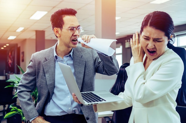 businessman is arguing with a colleague about a paperwork errors