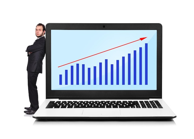 Businessman and laptop with chart