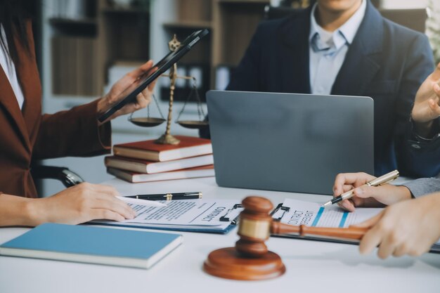 Businessman and lawyer discuss the contract document Treaty of the law Sign a contract business