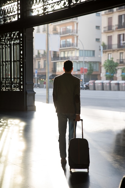 Businessman leaving the train station