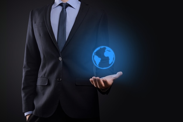 Businessman man hand holding Earth icon , digital globe.