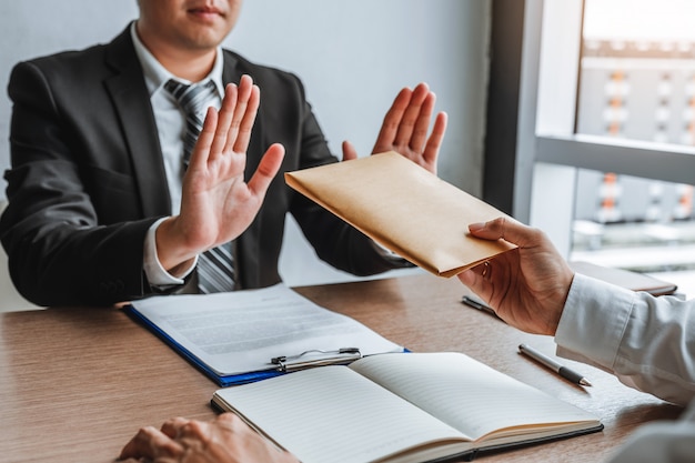 Businessman manager refusing receive money