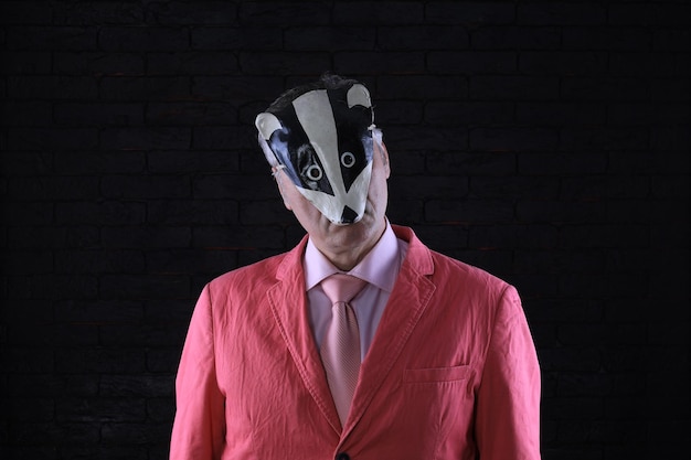 businessman in a mask of a raccoon