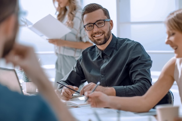 Businessman at a meeting with his business team