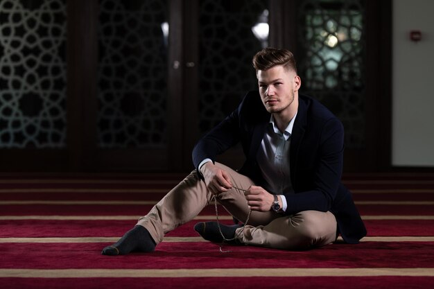 Businessman Muslim Praying in Mosque