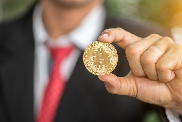 Businessman offers bitcoin - bit coin BTC the new virtual money