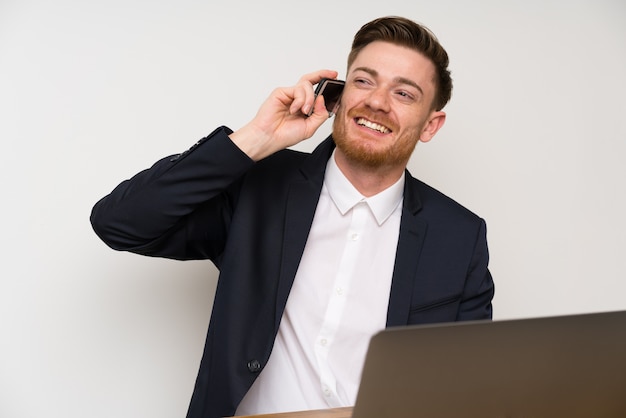 Businessman in a office with mobile