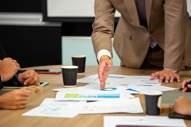 Businessman people brainstorming with their business team in meeting room. Professional conference manager cooperation.