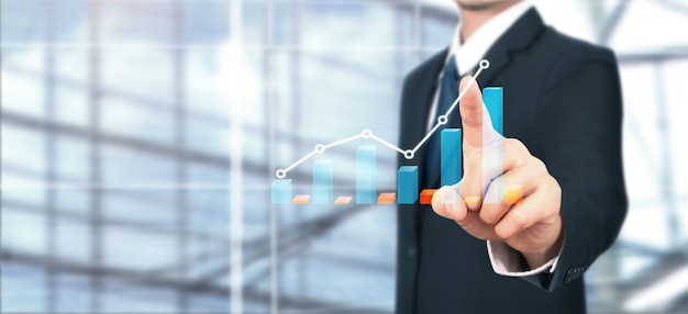 Businessman plan graph growth and increase of chart positive indicators