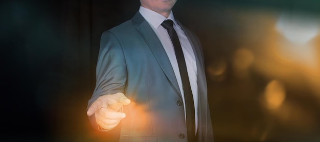 Businessman pointing at something with his index finger