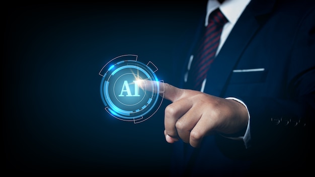 Businessman pointing spot on the AI(Artificial Intelligence) wording with the circle digital hi-tech technology circuit design background. concept innovation.