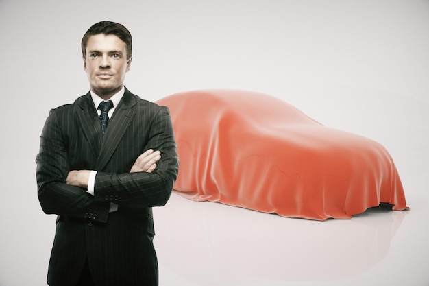 Businessman presenting new car