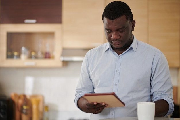 Businessman Reading News Article