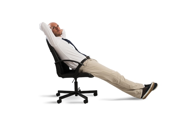 Businessman relax and thinks sitting in a office chair